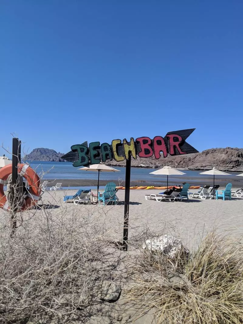 beach bar sign at villa del palmar loreto mexico