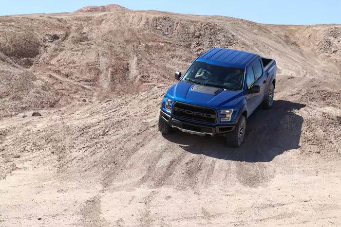 ford raptor on dirt trail