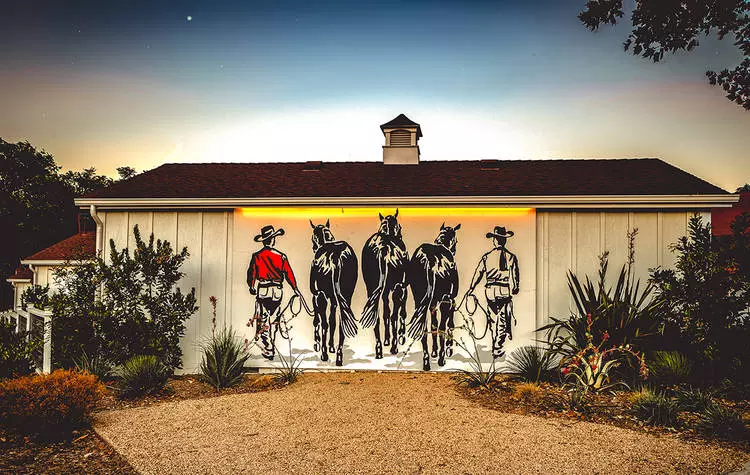 stables inn cowboys mural