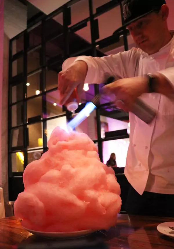 chef david burke lights the cloud cotton candy dessert