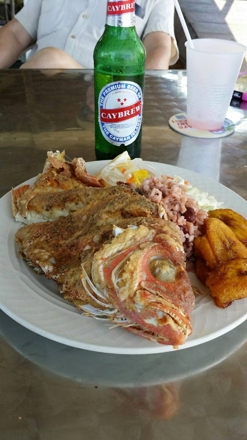 caybrew beer and fried snapper fish in cayman islands