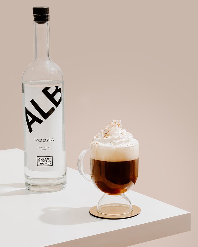 ALB Vodka Irish Coffee cocktail topped with cream and nutmeg