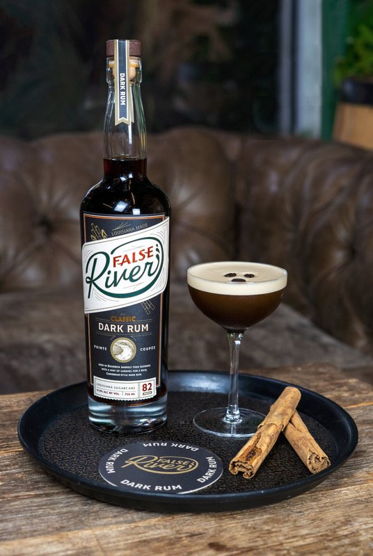 False River Spiced Espresso Martini next to a bottle of False River rum