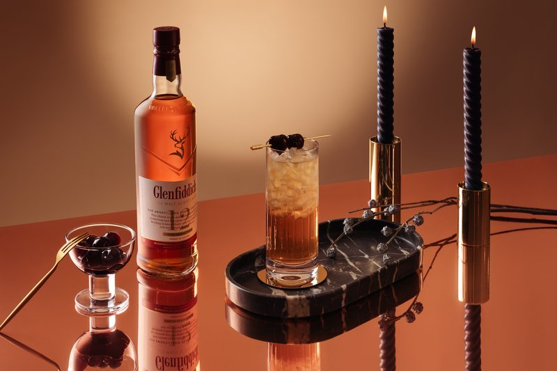 Glenfiddich Speyside Cobbler over crushed ice with a dark cherry garnish