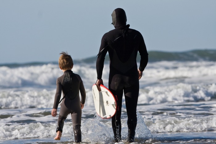 surfing father and son