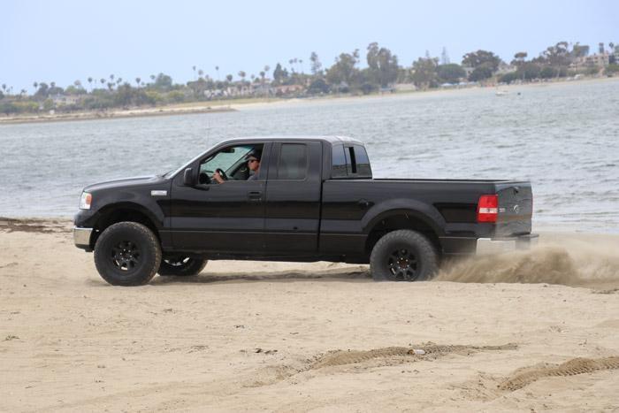 f 150 with general tire at x in sand at the beach