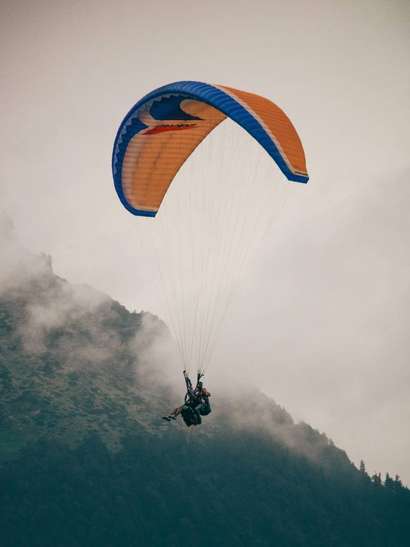 paragliding in mountains manali himachal pradesh india