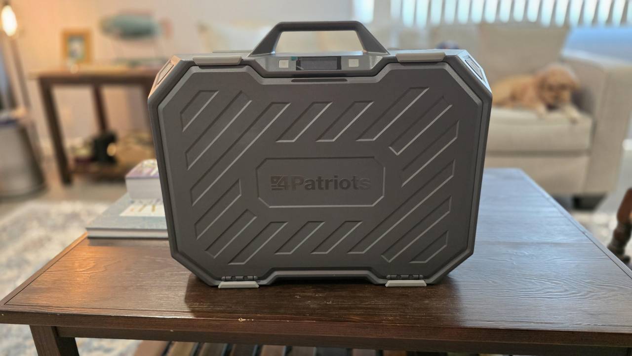 Patriot Power Solar Generator AlphaCase Elite hard case open, showing the 4Patriots logo and foam-lined interior