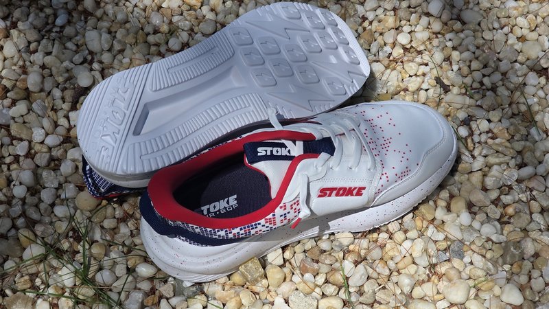 The Stoke FO-MO 2Fiddy showing the PWR-EQP outsole tread pattern and the red-white-and-blue interior with the Stoke insole