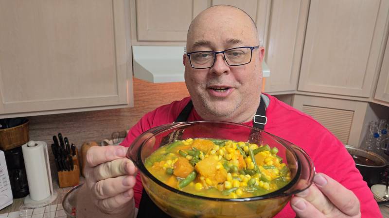 james holding finished succotash