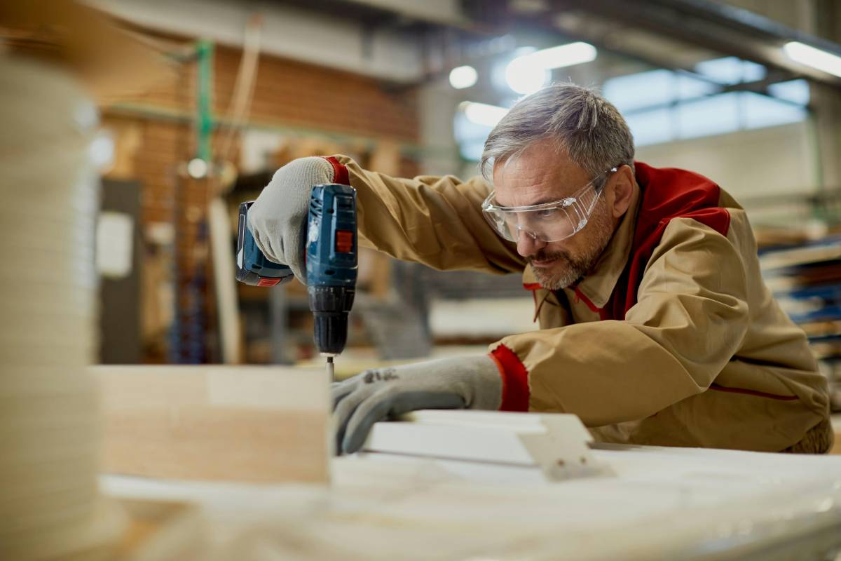 man using power drill