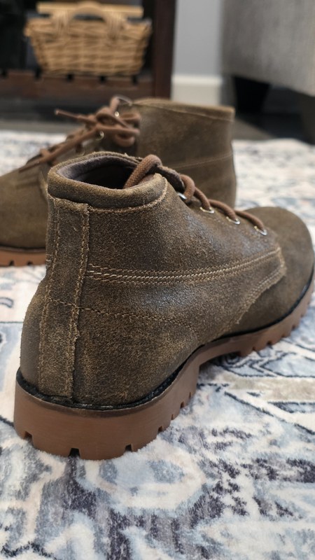 Side profile of Wolverine 1000 Mile Legacy Cort Boot showing roughout suede leather upper, double-needle stitching detail, and the rubber lug midsole