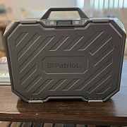 Patriot Power Solar Generator AlphaCase Elite hard case open, showing the 4Patriots logo and foam-lined interior