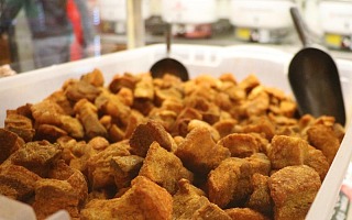 Cracklins are just one of the man-friendly foods you'll need to try when visiting Lafayette, Louisiana on a guys weekend.