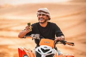 dune riding on an atv in abu dhabi